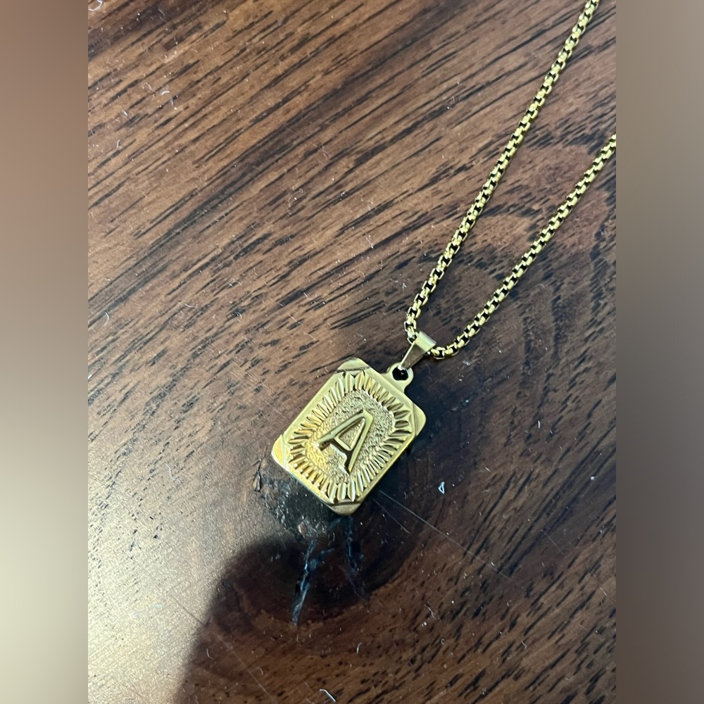 Gold chain with thick A initial pendant